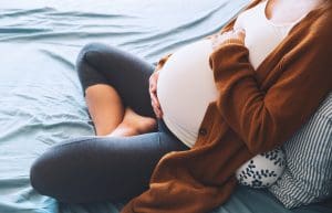 Pregnant woman holding belly: Top Ten Most Read Posts 2021