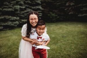 Aunt hugging her young nephew
