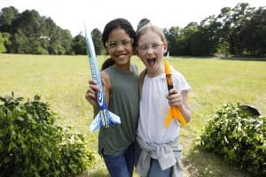 two Cub Scouts holding model rockets -Cub Scouts Fall Day Camp C