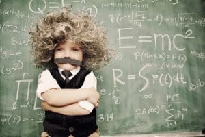 toddler philosophies on life - A young math whiz smiles as he has solved the riddles of the universe.