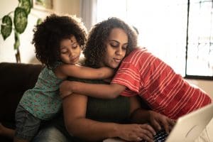 Mother trying to work with kids annoying her at home - We Don't Talk About Burnout