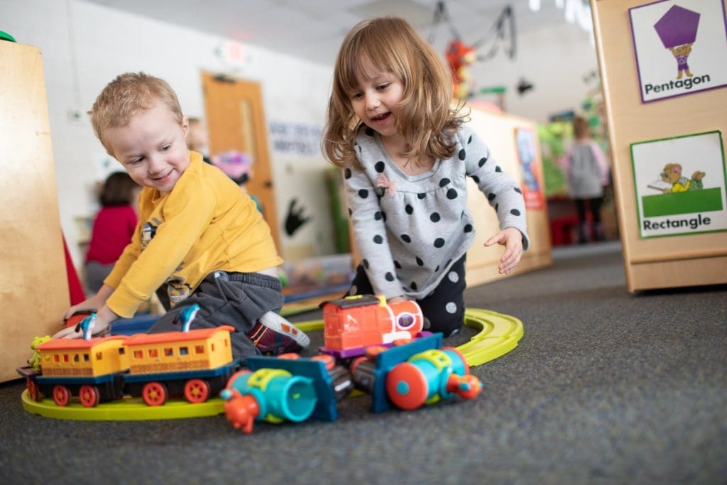 tending to the whole child 2022 - a boy and girl preschooler play trains