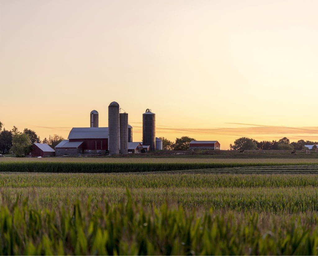 far range shot of a farm - reasons to celebrate national dairy month